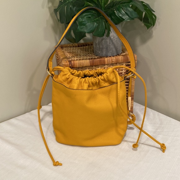 Vince Camuto Pebbled Leather Mandi Drawstring Bucket Shoulder Bag in Mustard - Picture 2 of 11